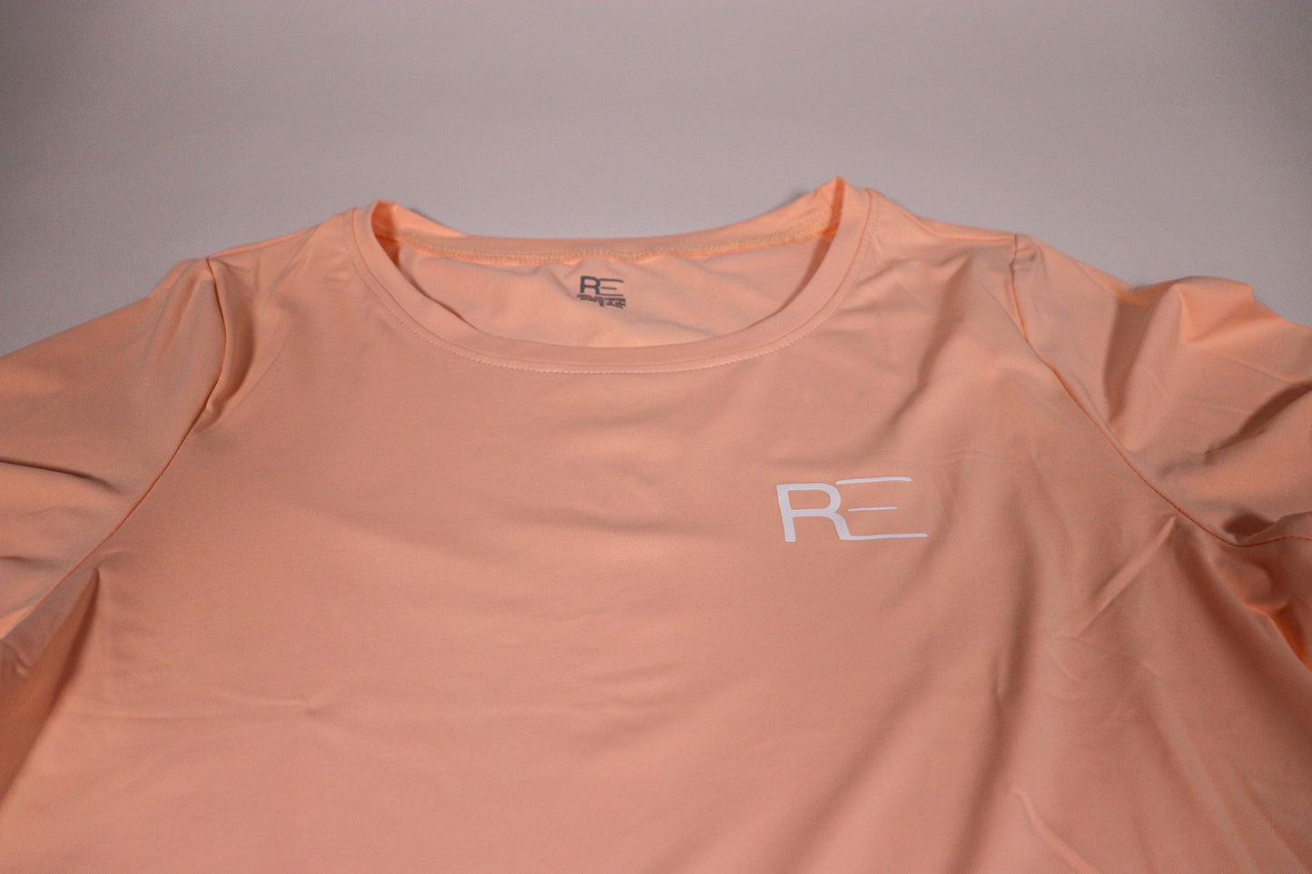 Performance buttery soft scoop neck